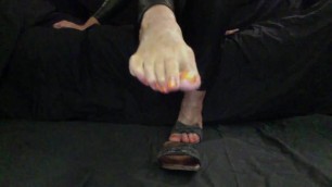 Feet orange Toes in mules with soles view