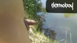 Naked Twink In The River Is Pissing And Cumming