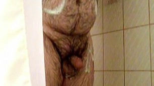 Furry Chubby Bear Strokes His Cock In The Shower